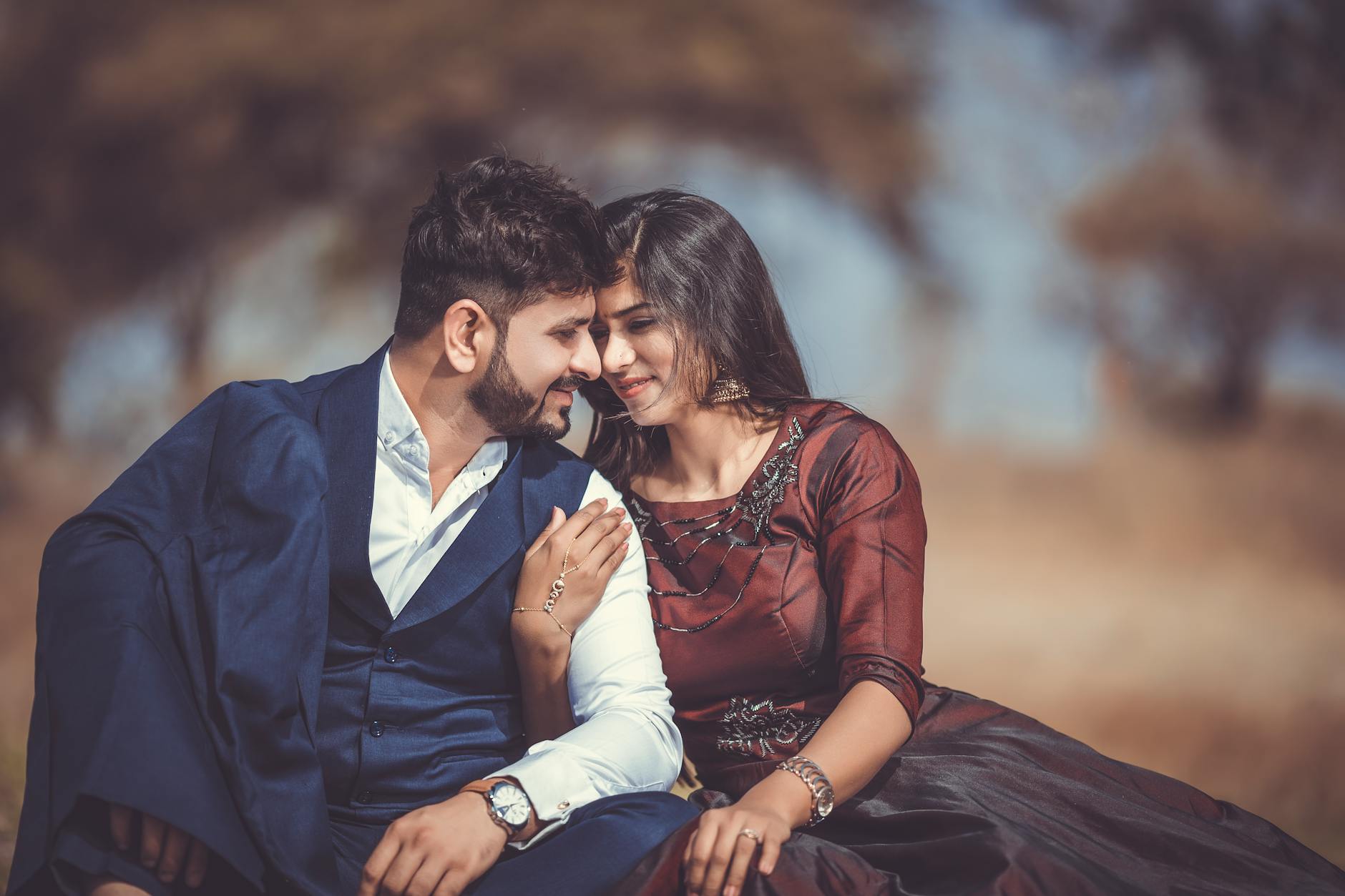 South Asian couple embracing outdoors