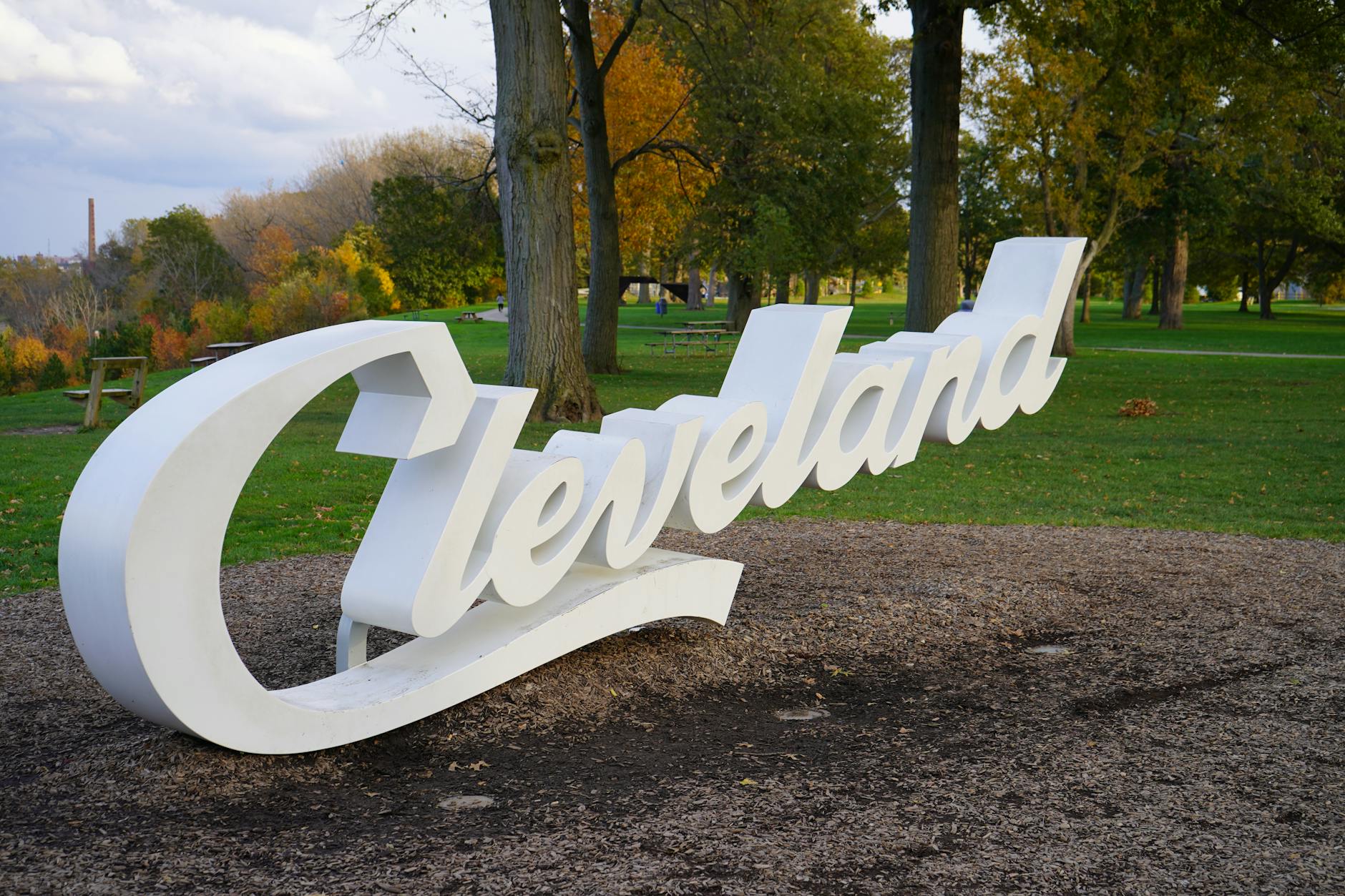 White Cleveland sign in a park