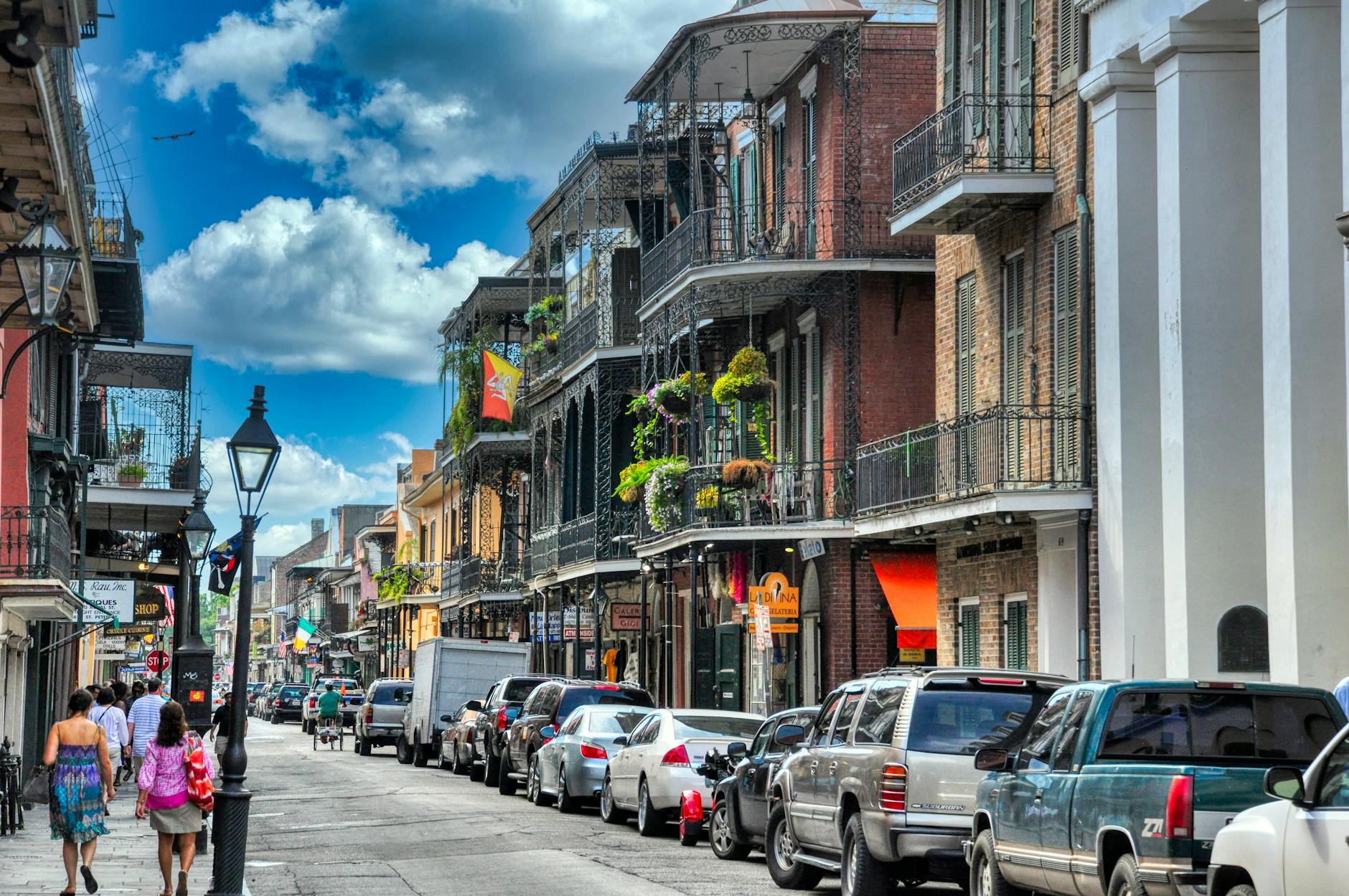 City of New Orleans in the French Quarter with people walking down the street