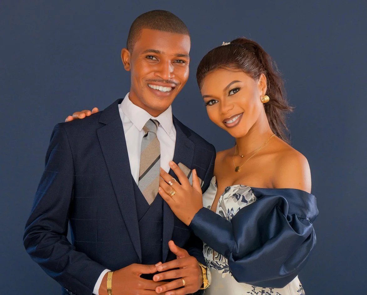 African American couple paired by matchmakers in Norfolk smiling at the camera